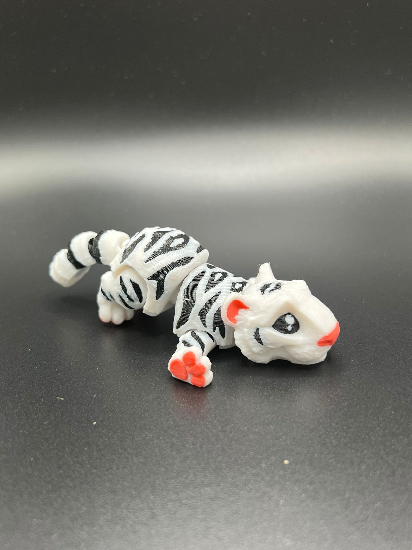 Mini Tiger Articulated Fidget Toy - scale view