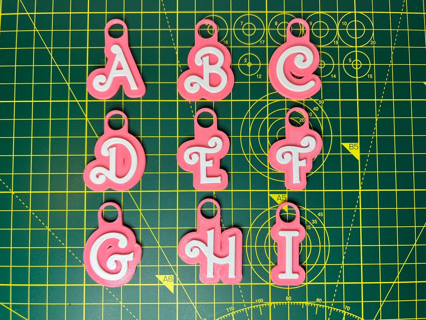 Custom Pink and White Name Keyring - scale view