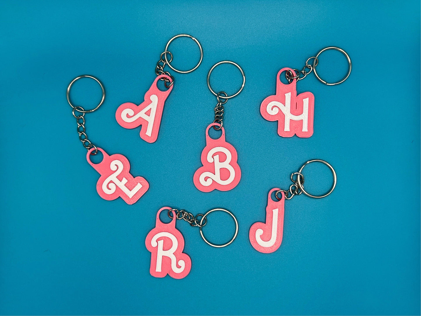 Custom Pink and White Name Keyring - product photo