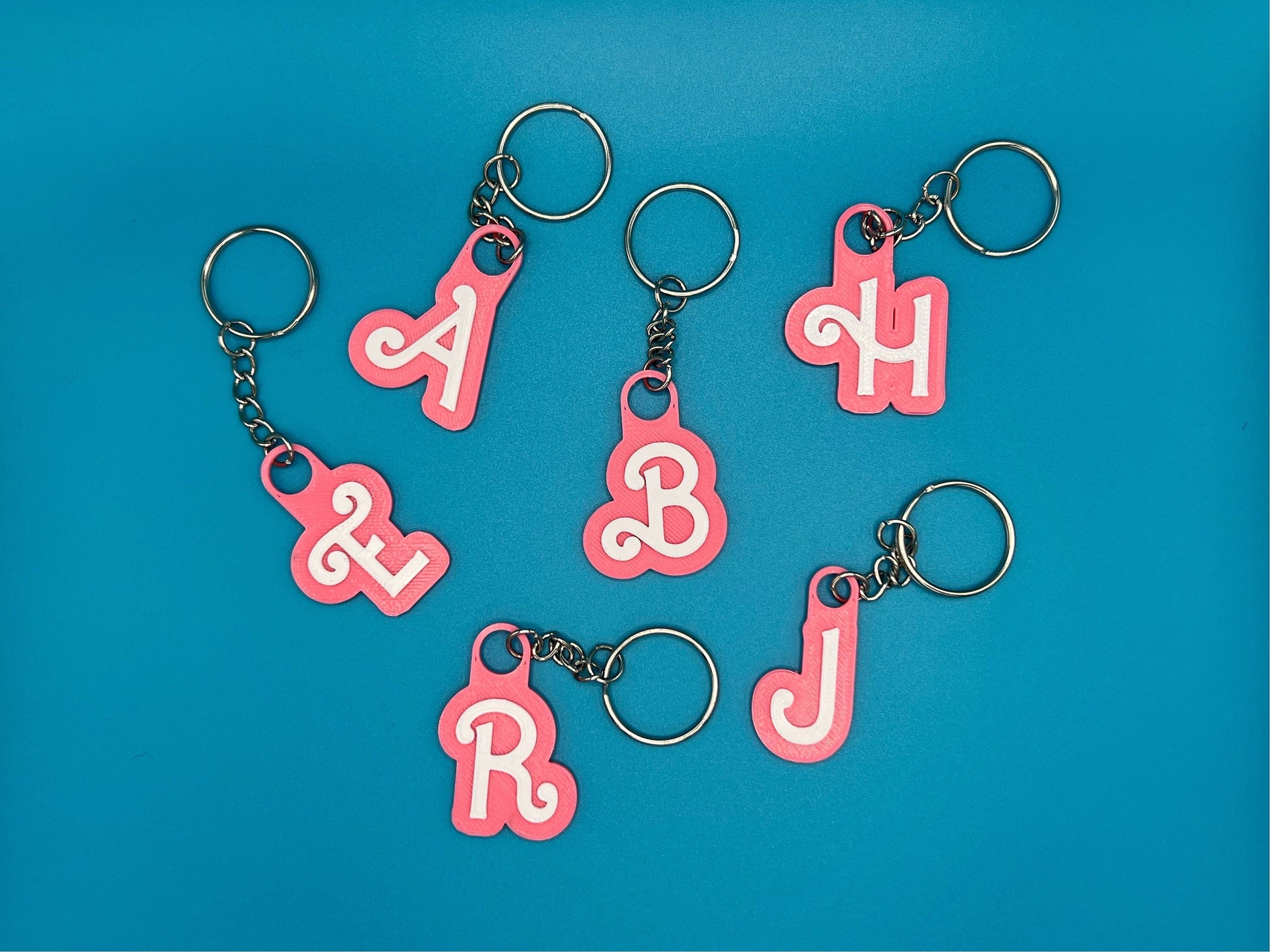 Custom Pink and White Name Keyring - product photo