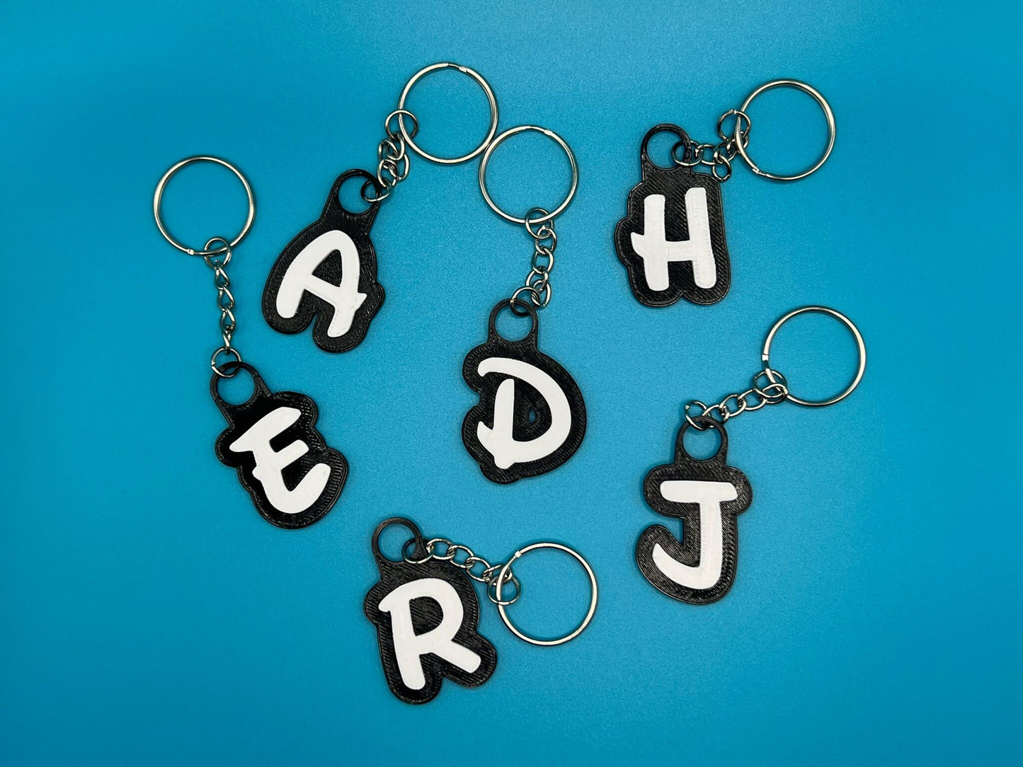 Custom Black and White Name Keyring - product photo